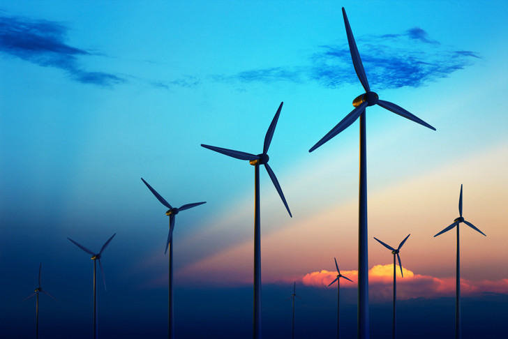 Wind turbines at sunset